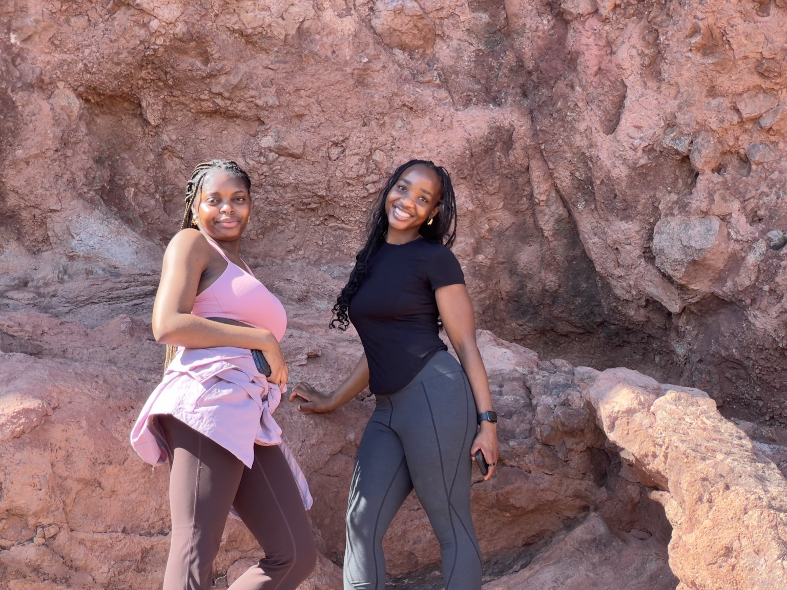 Two friends by red rock